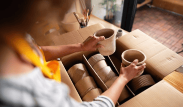 woman unpacking sustainable packaging